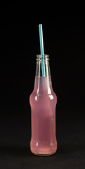 A photo of a pink soft drink. 