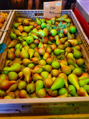Pears in a box on the Italian market.