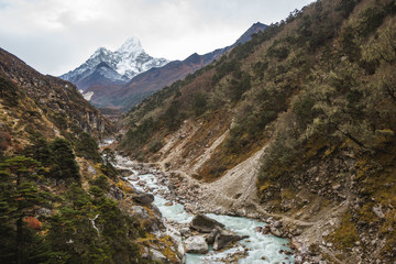 Fototapeta na wymiar Bhote river and Ama Dablam mount. Nepal
