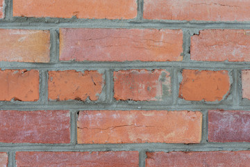Obraz premium Weathered stained old red brick wall background. Close up
