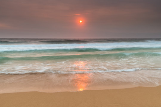 Sunrise Seascape and Hazy Sky with High Clouds