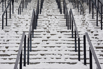 Street stairs covered with snow and ice.