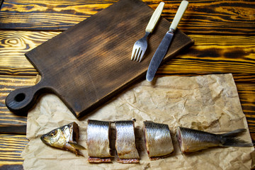 herring on the table with vegetables and fruits