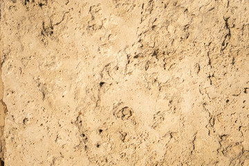 texture of a block of sandstone carved and weathered