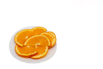 Obraz na płótnie Canvas Slices of orange on a plate on a light background. Tangerines, Citrus, Fruits, Food, Vitamin C, Detox. Minimalism style.