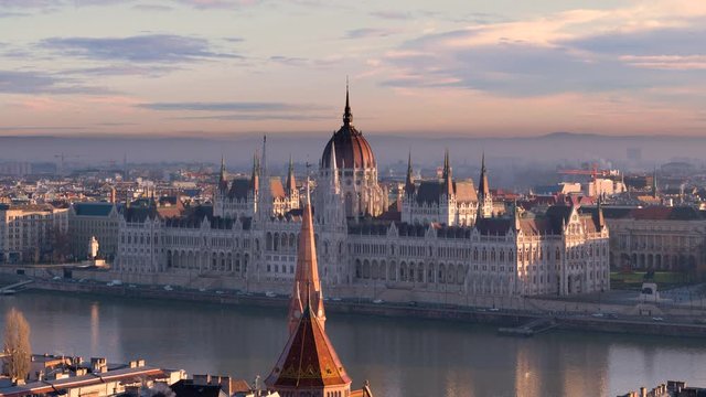 The building of the Budapest Parliament against the backdrop of a beautiful dawn sky. Dawn over Budapest