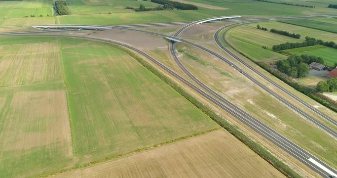 The A6 A7 Highway Intersection, Flying Forwards and Tilting Shot, Near Joure and Heerenveen - Friesland, Netherlands / Holland – 4K Drone Footage