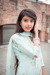Chudiyan. Bracelets on the girl's hands. Traditional accessories of Indian girls. Girl in...