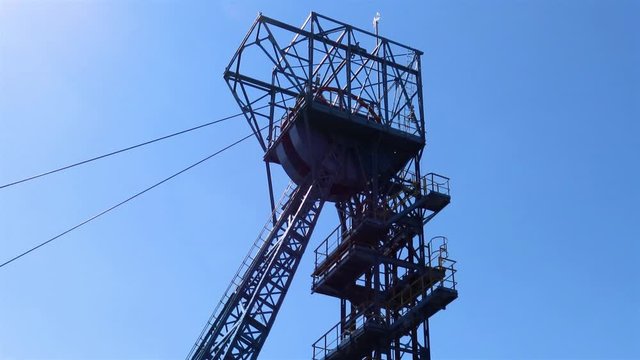 Rotating headgear of very old black coal mine Guido in Zabrze, Poland which is tourist attraction in recent years. The mine was built in 1855.