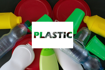 Plastic recycling. The concept of ecology, collection and disposal of plastic. Top view