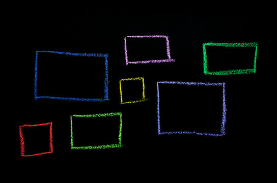 colored hand drawn rectangles on chalkboard
