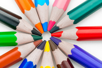 Fototapeta premium concept of colored pencils arranged in a circle