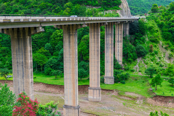 High road bridge in the picturesque mountains of the Caucasus in Georgia © kosmos111