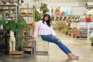 Fototapeta na wymiar Portrait Asian thai cute teen woman girl long hair. Face focus selected and blurred natural background.