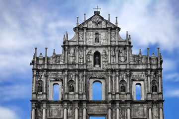 Ruins of St. Paul's Church building in Macau on blue sky background, China.