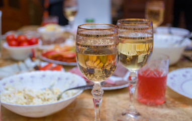 Two glasses of champagne on the festive table