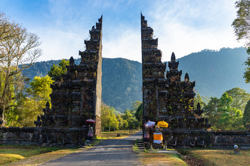 Amazing view of Handara gate in the morning with the mist over mountains in Bali, Indonesia.