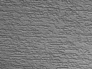 Silver background facade plaster . Monolithic plaster decorative backdrop. Single layer scraped...