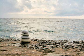 Balance, peace of mind, different sizes stones form a pyramid.