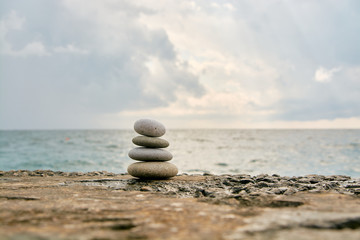 Balance, peace of mind, different sizes stones form a pyramid.