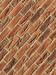 Old red brick wall texture background, orange stone block wall texture, rough and grunge surface as used for backdrop, wallpaper and graphic web design. Interior home new pattern designed structure 