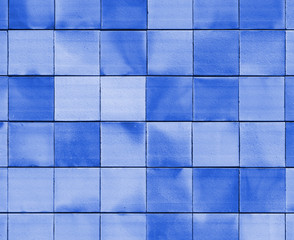 Old blue brick wall texture background, orange stone block wall texture, rough and grunge surface as used for backdrop, wallpaper and graphic web design. Interior home new pattern designed structure 