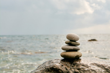 Balance, peace of mind, different sizes stones form a pyramid.