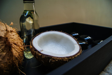 coconut, massage, sand, oil, coconut oil, obsidian, rocks, hot stones, alternative therapies,...