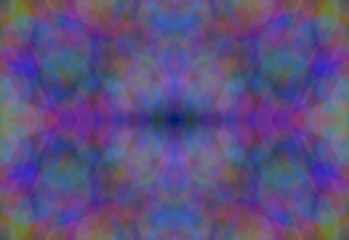 Abstract color pattern inside of kaleidoscope. Little pieces of light are mixed in one geometric ornament. Colorful vivid background. Seamless multicolored tile backdrop.