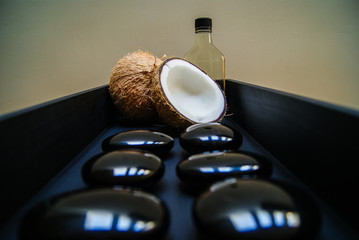 coconut, massage, sand, oil, coconut oil, obsidian, rocks, hot stones, alternative therapies,...