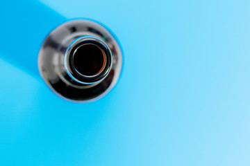 Empty dark bottle without cork and label