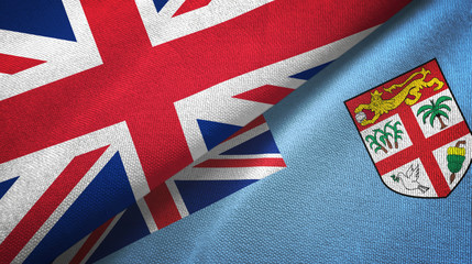 United Kingdom and Fiji two flags textile cloth, fabric texture