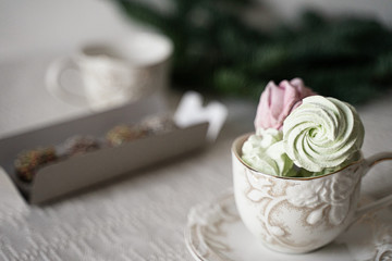 green, pink, marshmallows in a cup, herringbone-shaped cake