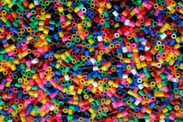 Colorful beads on the water, multicolor background