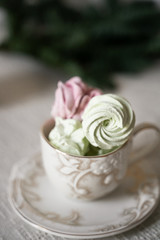 green, pink, marshmallows in a cup, herringbone-shaped cake