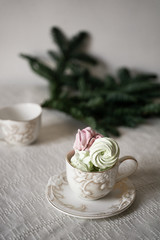 green, pink, marshmallows in a cup, herringbone-shaped cake