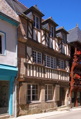 A half-timbered side-gabled residential house in the old town of Tréguier, France