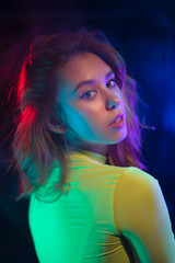 neon light and portrait of a girl.