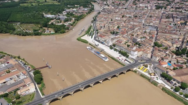 Panoramic aerial view of Libourne city on Dordogne river on sunny summer day, Gironde, France