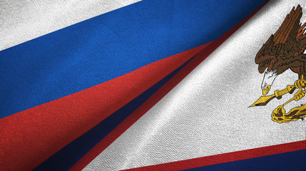Russia and American Samoa two flags textile cloth, fabric texture