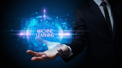 Man hand holding MACHINE LEARNING inscription, technology concept