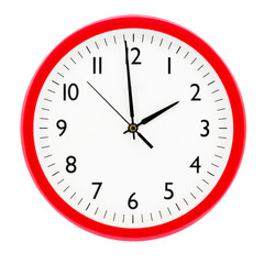 Clock with red round frame on white isolated background shows 1(13) hours 59 minutes_