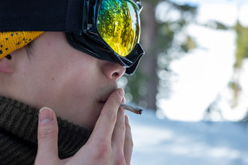 Snowboarder smoking - Snowboarder culture - Kirkwood, CA, January 04, 2020