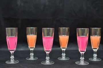 Mock up  design set of elegant and traditional drink ware / drinking glass & Jar for wine or juice, transparent isolated on black background template for branding identity and company logo isolated