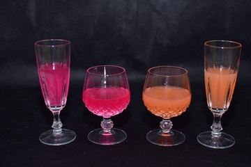 Mock up  design set of elegant and traditional drink ware / drinking glass & Jar for wine or juice, transparent isolated on black background template for branding identity and company logo isolated