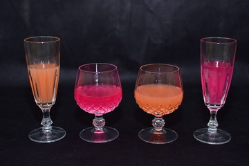 Mock up  design set of elegant and traditional drink ware / drinking glass & Jar for wine or juice, transparent isolated on black background template for branding identity and company logo isolated