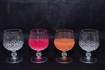 Mock up  design set of elegant and traditional drink ware / drinking glass & Jar for wine or juice, transparent isolated on black background template for branding identity and company logo isolated