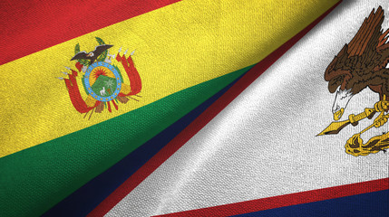 Fototapeta premium Bolivia and American Samoa two flags textile cloth, fabric texture