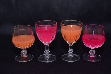 Mock up  design set of elegant and traditional drink ware / drinking glass & Jar for wine or juice, transparent isolated on black background template for branding identity and company logo isolated