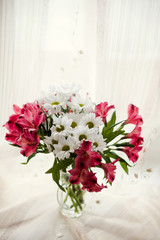 white chrysanthemums and pink Alstroemerias